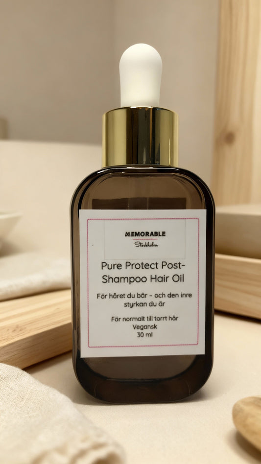 Pure Protect vegansk post-shampoo hårolja i glasflaska, för alla kön.
